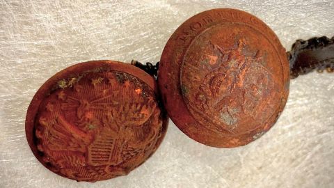 Buttons that experts believe were from Confederate Gen. Robert E. Lee's dress coat were among the items found inside the time capsule.