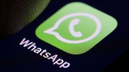 The Logo of instant messaging service WhatsApp is displayed on a smartphone.
