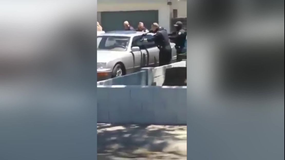 Phoenix police are under scrutiny following the release of video from Saturday in which officers fatally shot a man inside a parked car.