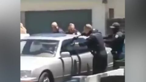 Phoenix police are under scrutiny following the release of video from Saturday in which officers fatally shot a man inside a parked car.
