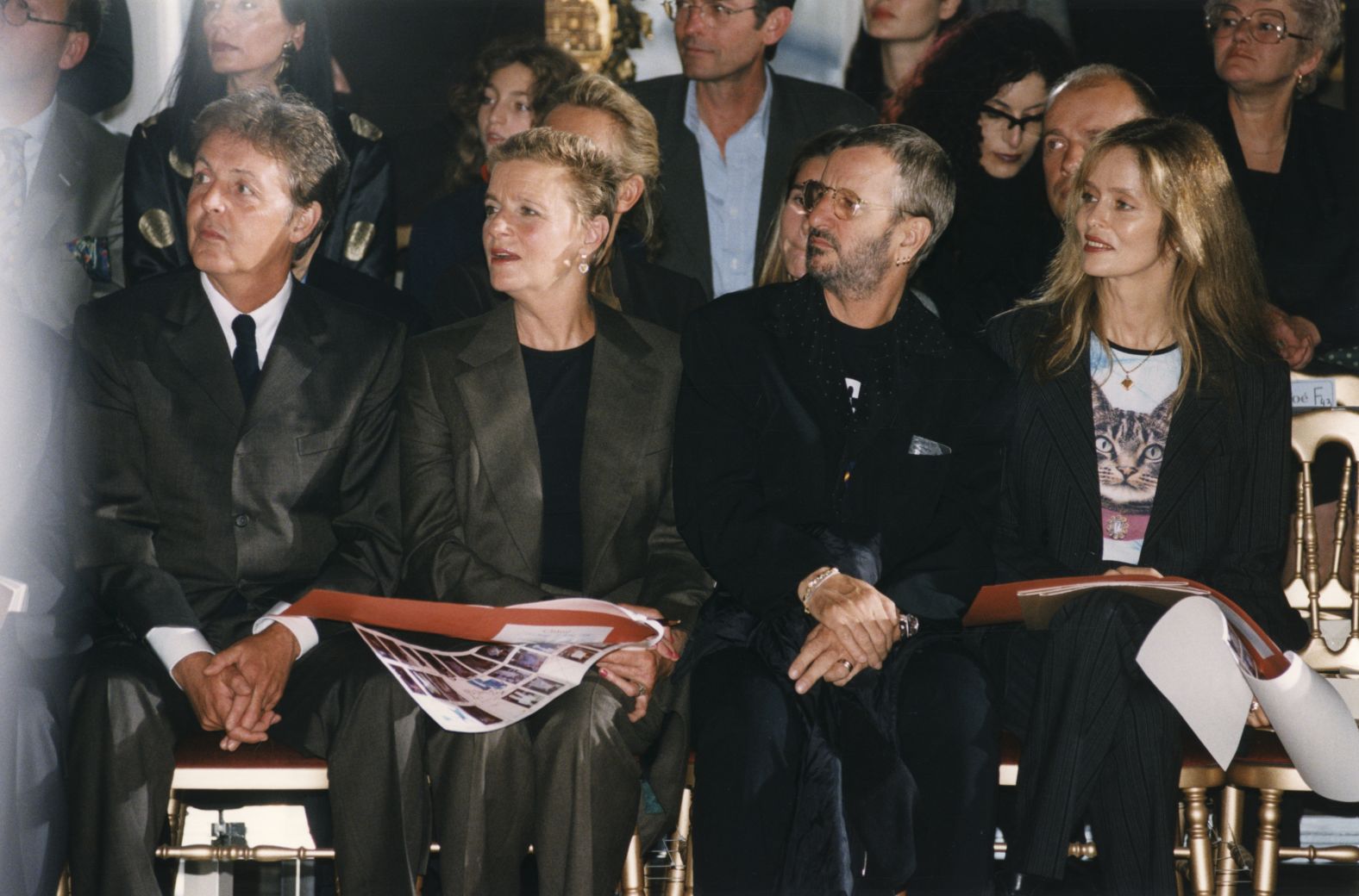 Starr and his wife, Barbara, sit with McCartney and his wife, Linda, at a fashion show in Paris in 1997. They were there to support McCartney's daughter Stella, a fashion designer.