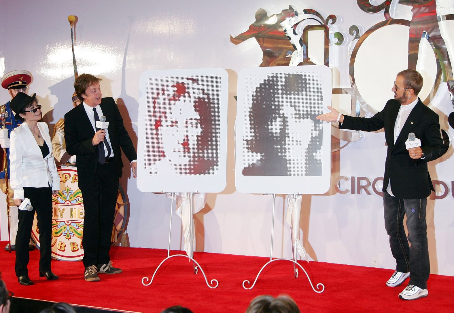 Starr and McCartney are joined by Lennon's widow, Yoko Ono, as they unveil plaques of Lennon and Harrison in Las Vegas in 2007. It was the first anniversary of "Love," Cirque du Soleil's Beatles-themed show at the Mirage Hotel & Casino.