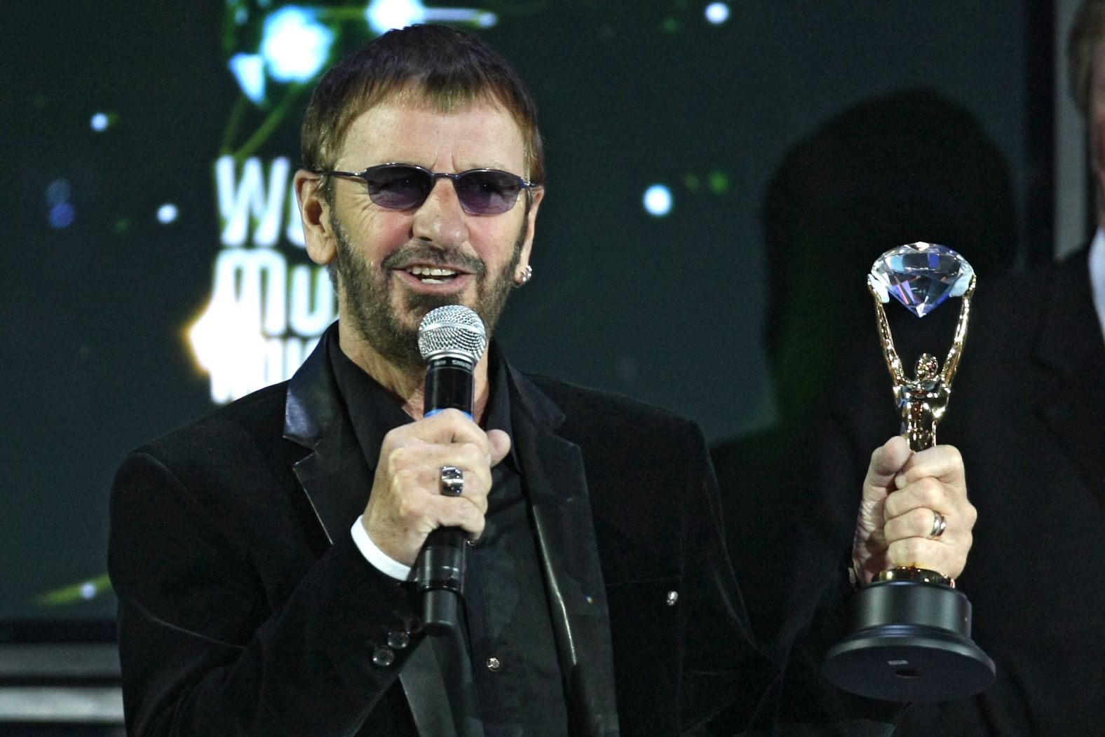 Starr accepts a Diamond Award on behalf of the Beatles during the World Music Awards in 2008.