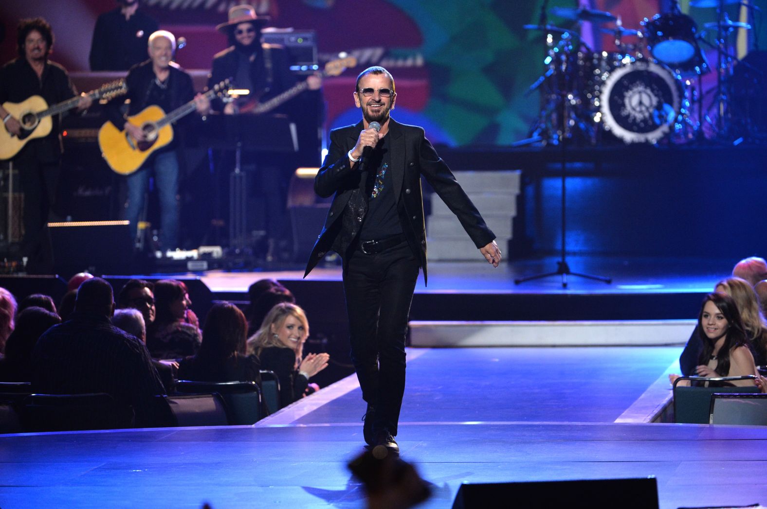 Starr performs on stage for a special television program in January 2014. The show was called "The Night That Changed America: A Grammy Salute to the Beatles."