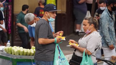 Many shoppers wore masks but their use was far from universal.