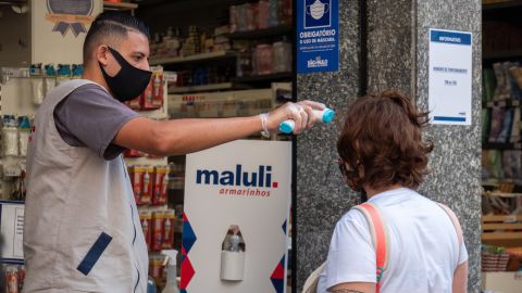 Temperature checks were few and there appeared to be no limits on customers in stores.