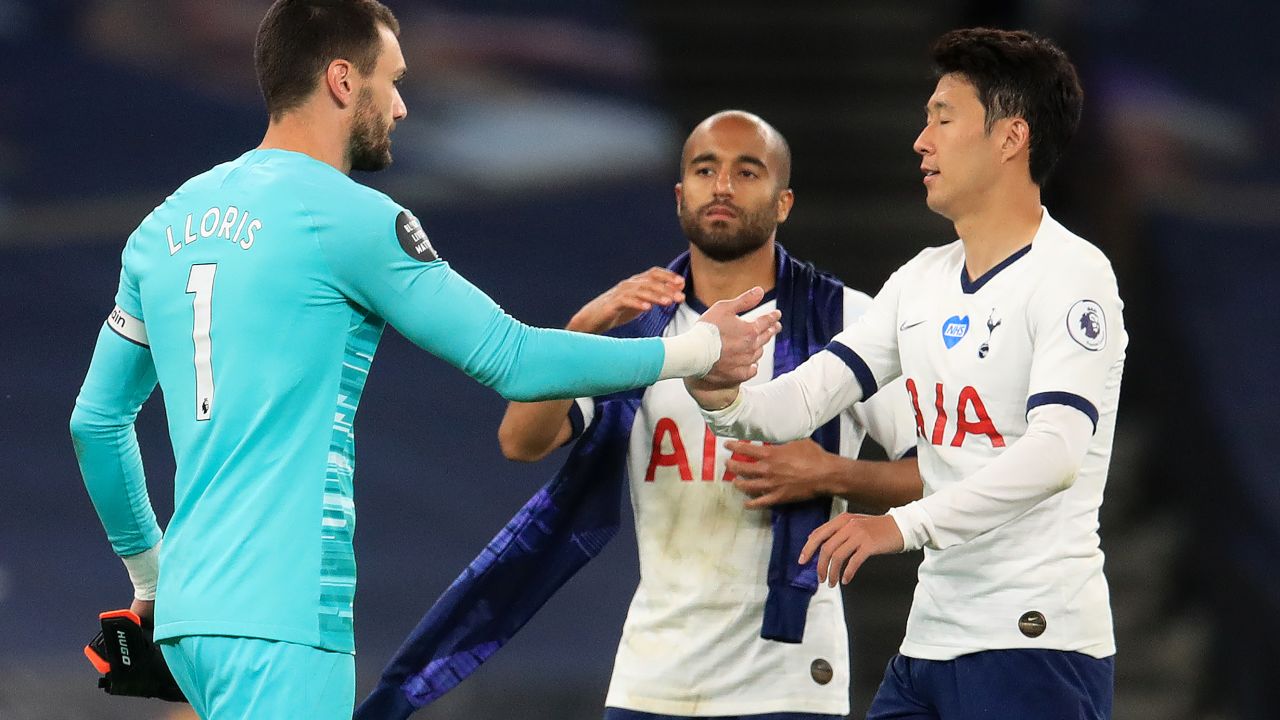 Tottenham goalkeeper Hugo Lloris embraces striker Son Heung-Min after the game. 