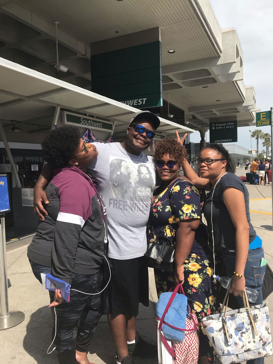 Atatiana, Adarius and Amber Carr pose with "sister-cousin" Cerese Fortson In San Diego in 2018. 