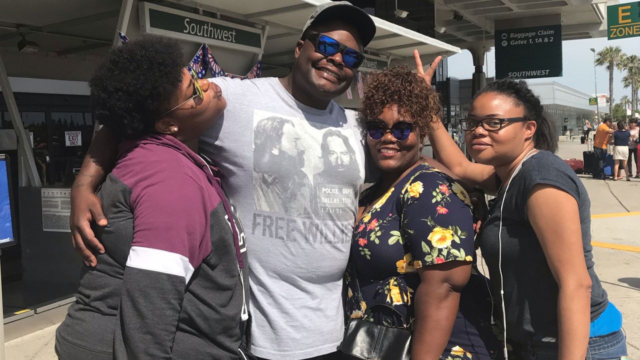 Atatiana, Adarius and Amber Carr pose with "sister-cousin" Cerese Fortson In San Diego in 2018.
