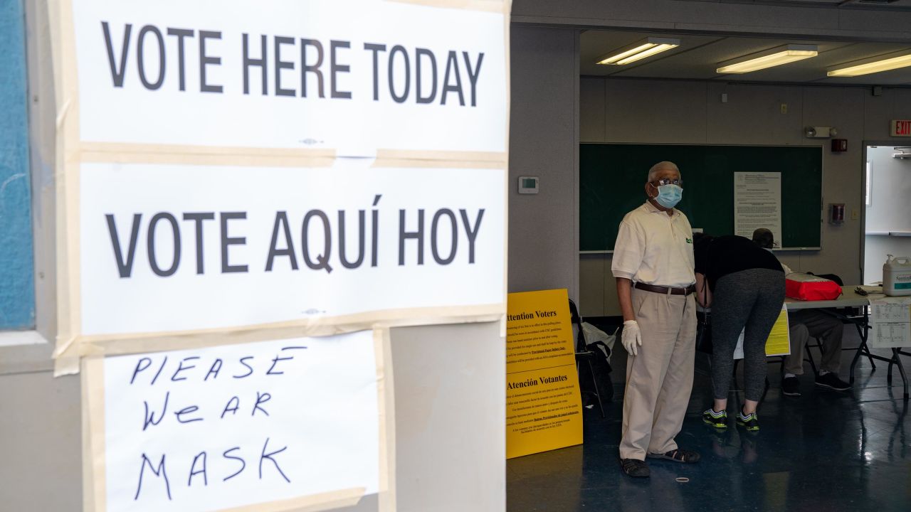 A poll worker at Liberty High School on July 7, 2020 in Jersey City, New Jersey. New Jersey residents will choose their candidates for president, Senate and House but because of the pandemic most are casting their votes by mail-in ballots.