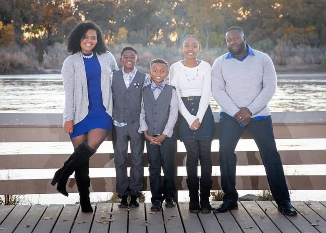 Jaime Nalls (far left) of Albuquerque, New Mexico, is shown here with her husband and three of her four children. Nalls' 9-year-old son (center) has asthma, so she hopes that he can continue some online learning in the fall.