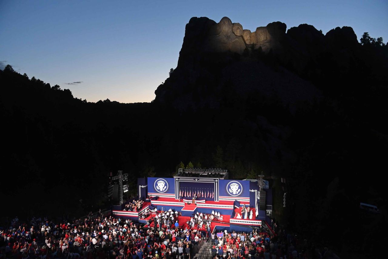 US President Donald Trump speaks at the Mount Rushmore National Memorial in Keystone, South Dakota, on July 3. Social distancing was not observed at the Independence Day celebration, where <a href="index.php?page=&url=https%3A%2F%2Fwww.cnn.com%2F2020%2F07%2F05%2Fpolitics%2Fdonald-trump-july-4-coronavirus%2Findex.html" target="_blank">Trump claimed that 99% of coronavirus cases in America are "totally harmless."</a>