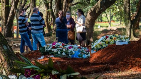 There are so many burials at Vila Formasa these days, that families are restricted to just a few minutes to say their final goodbyes.