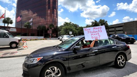 Teachers were protesting outside Florida's Orange County Public Schools headquarters on Tuesday.