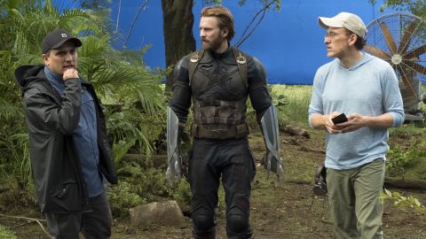 Directors Joe Russo, left, and Anthony Russo, right, flank Chris Evans on the set of 'Avengers: Infinity War.' (Chuck Zlotnick/Marvel Studios)