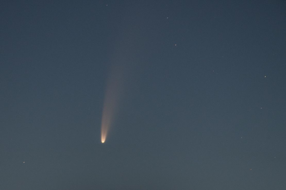 The comet shines above  L'Aquila, Italy, on July 7.