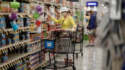 A customer wearing a protective mask shops inside an Albertsons Cos. grocery store in San Diego, California, on Monday, June 22, 2020.