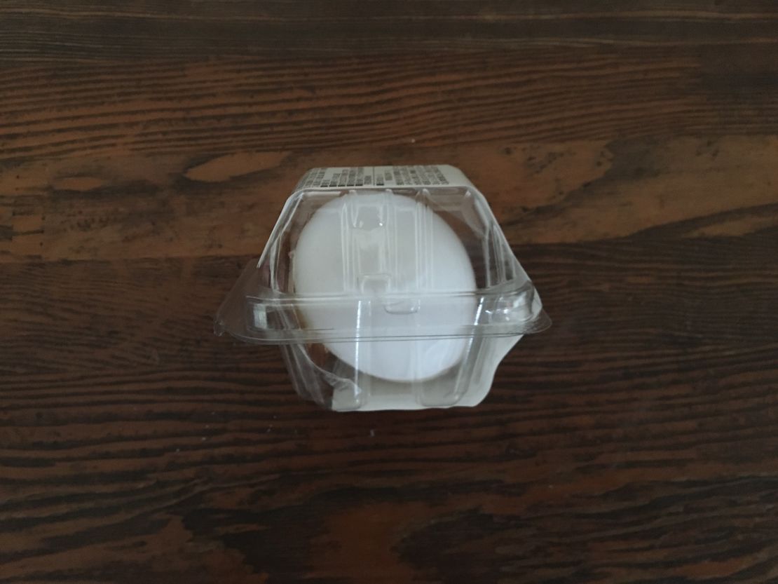 A convenience store hard-boiled egg is protected in plastic packaging. 