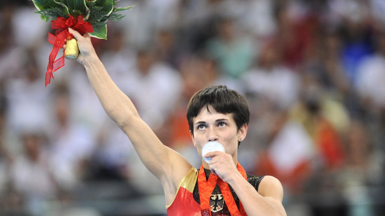 Chusovitina holds her silver medal for the vault at the 2008 Olympic Games in Beijing, where she competed for Germany.