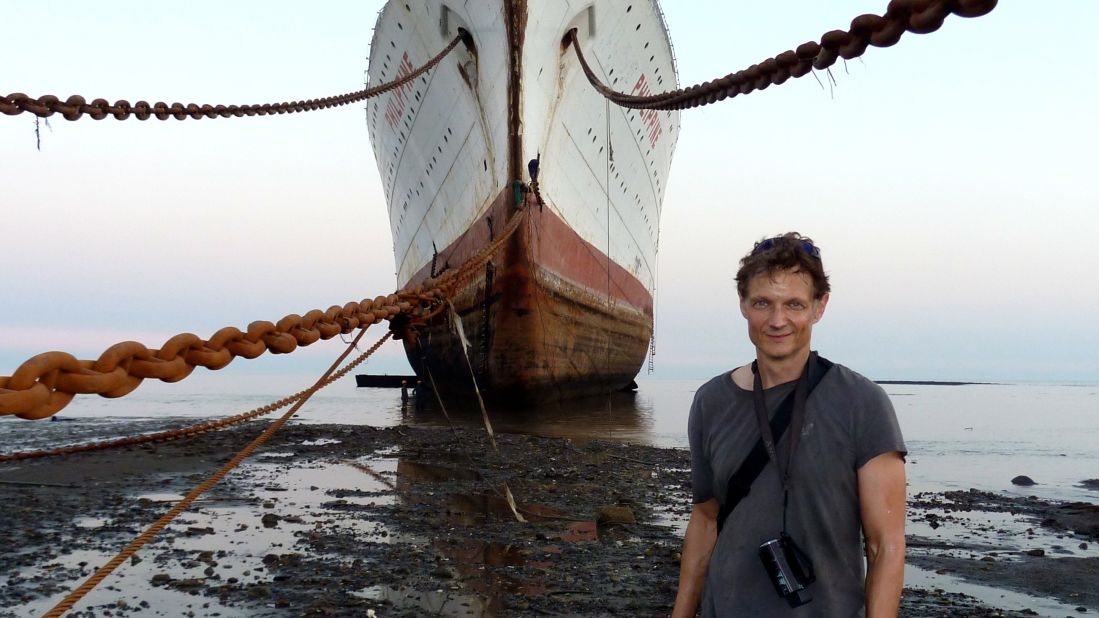 <strong>Urban explorer:</strong> Knego visits the shipyards to explore, take photographs and buy collectibles from inside the ships. He's pictured here at Alang with the former Italian liner MV Augustus in 2012. 