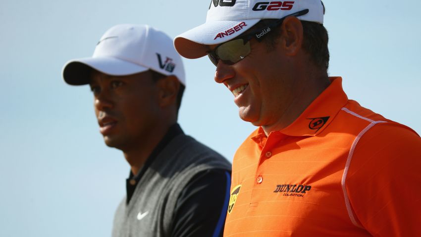 GULLANE, SCOTLAND - JULY 20:  Tiger Woods of the United States and Lee Westwood of England walks off the 12th during the third round of the 142nd Open Championship at Muirfield on July 20, 2013 in Gullane, Scotland.  (Photo by Matthew Lewis/Getty Images)