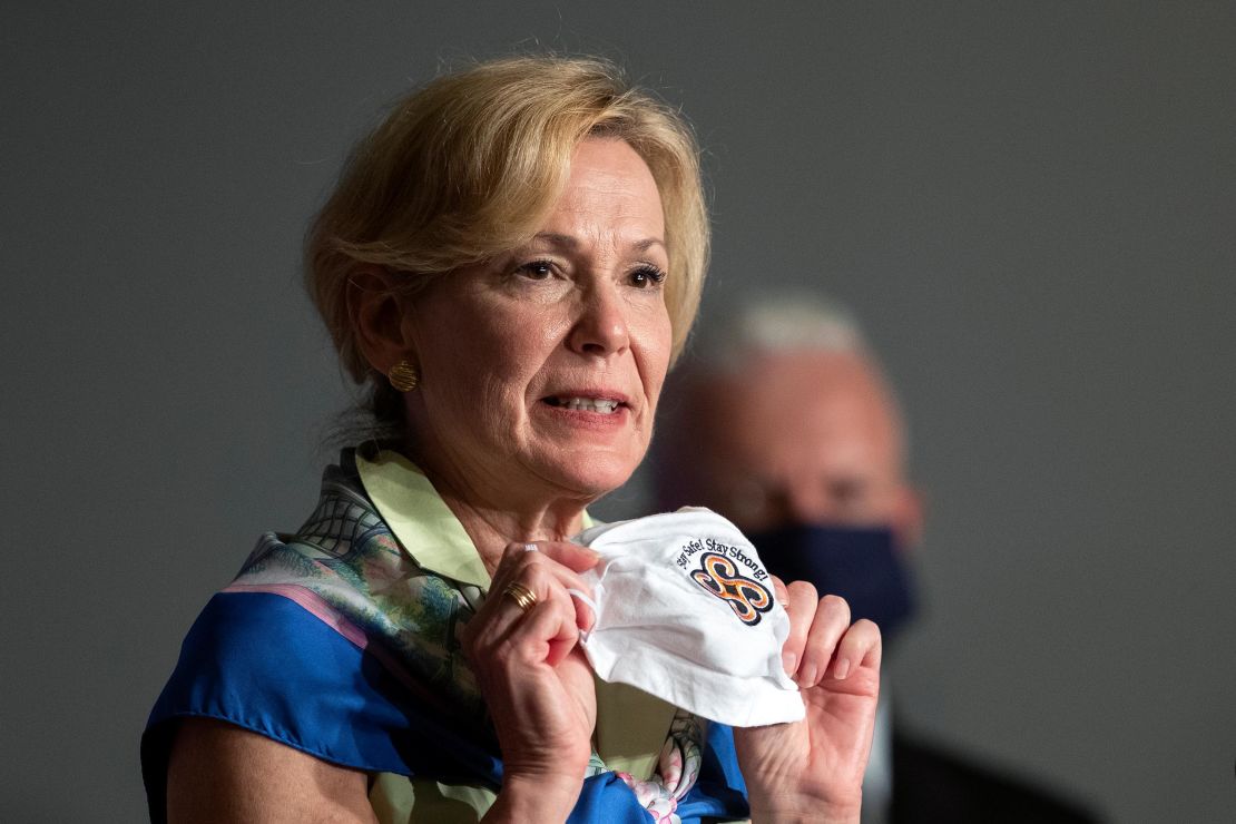 Dr. Deborah Birx holds her face mask as she speaks during a White House Coronavirus Task Force briefing at the Department of Education building on July 8.