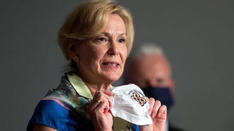Dr. Deborah Birx holds her face mask as she speaks during a White House Coronavirus Task Force briefing at the Department of Education building on July 8.