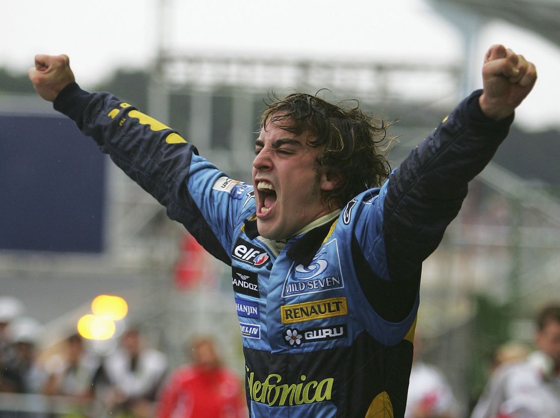 Alonso celebrates winning the world whampionship after finishing third in the Brazilian Grand Prix at the Autodromo Interlagos on September 25, 2005 in Sao Paulo, Brazil.