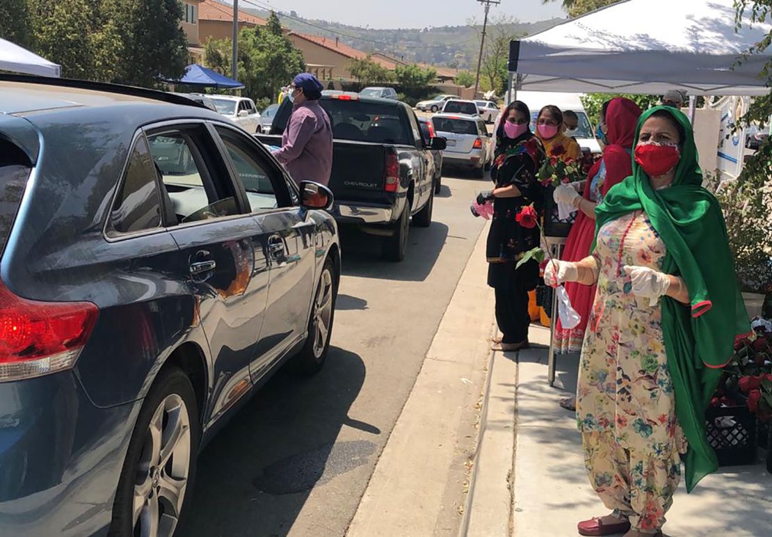 Gurpreet Singh and members of his Sikh community provide meals for those in need in Riverside, California.