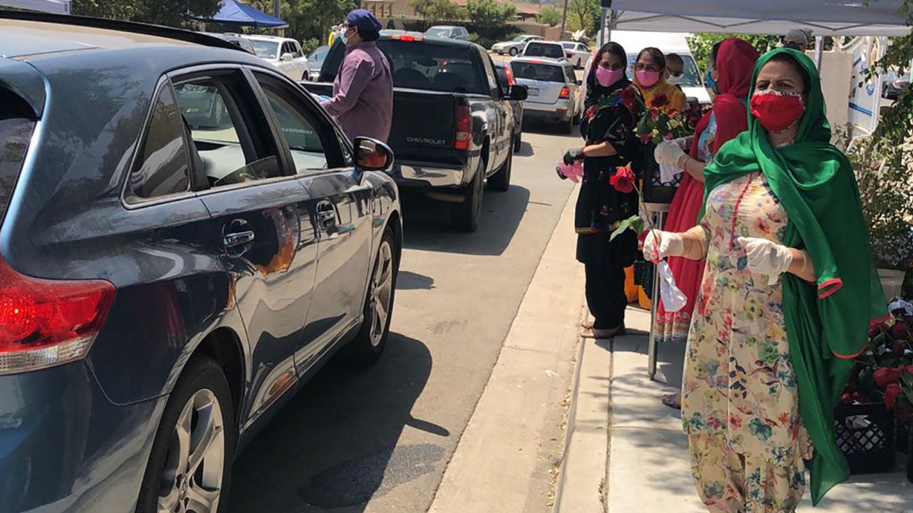 Gurpreet Singh and members of his Sikh community provide meals for those in need in Riverside, California.