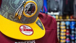 The Washington Redskins football team logo is displayed on a hat for sale at a store in San Francisco, California, U.S., on Wednesday, June 18, 2014. The Washington Redskins lost a trademark decision after a federal agency ruled the team's name disparaged Native Americans, threatening millions of dollars in sales of everything from football jerseys to beer coolers. Photographer: David Paul Morris/Bloomberg via Getty Images