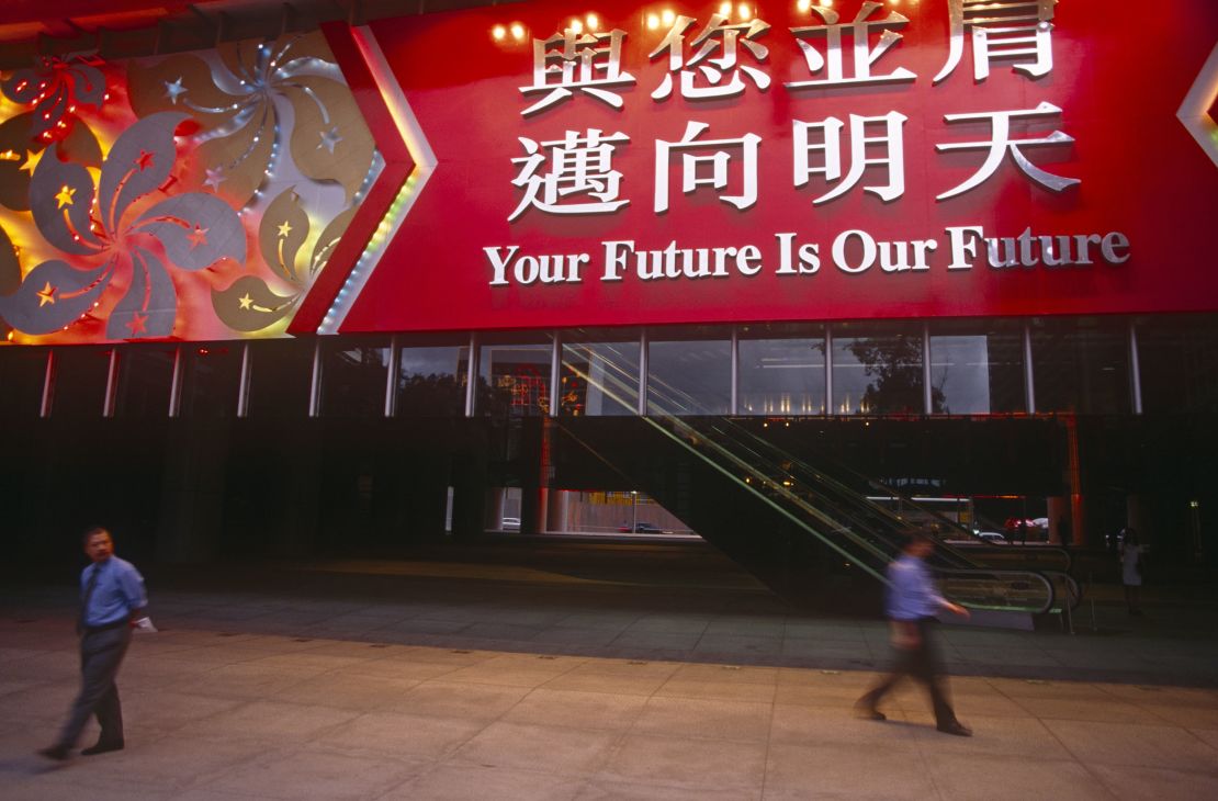 A large banner hanging over the entrance of HSBC on June 30, 1997, the day before the handover from Britain to China in Hong Kong.