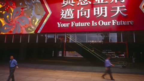 A large banner hanging over the entrance of HSBC on June 30, 1997, the day before the handover from Britain to China in Hong Kong.
