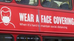 Mandatory Credit: Photo by Amer Ghazzal/Shutterstock (10670420c)
A sign on a London bus advising people to wear face coverings. The government and department of transport has announced the face coverings will become mandatoay on public tranport
Face coverings to become mandatory on public transport, Wimbledon, London, UK - 05 Jun 2020