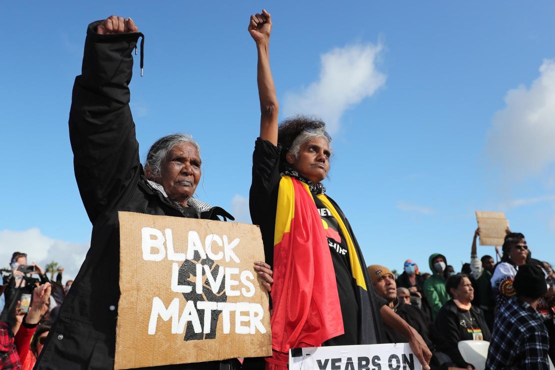 Indigenous protesters show their support during the Black Lives Matter rally in Perth, Australia, on June 13, 2020.