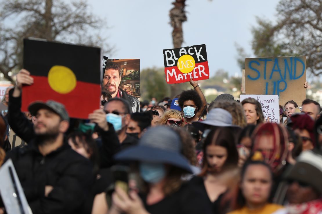 Protesters show their support during a Black Lives Matter rally in Perth, Western Australia, in June 2020.