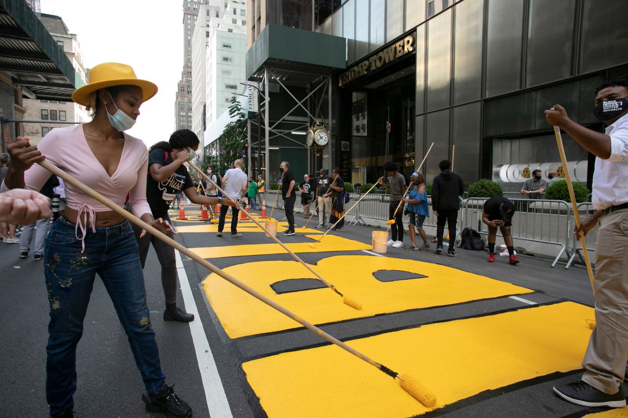 People in New York City paint a Black Lives Matter mural on the street <a href="https://www.cnn.com/2020/07/09/us/trump-tower-black-lives-matter-mural-new-york-trnd/index.html" target="_blank">directly outside of Trump Tower</a> on July 9.