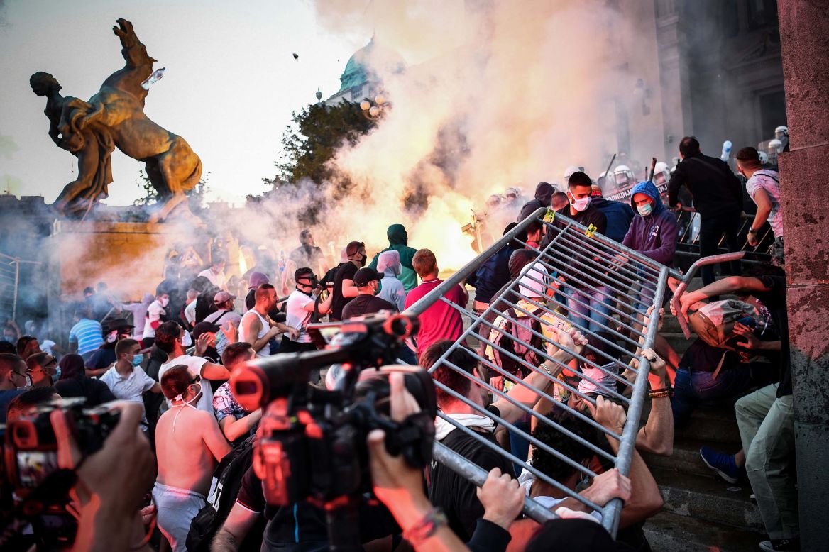 Protesters clash with police in front of Serbia's National Assembly building in Belgrade on Wednesday, July 8. <a href="https://edition.cnn.com/world/live-news/coronavirus-pandemic-07-08-20-intl/h_570a4c52facd841fd36b61439b06ef63" target="_blank">People were demonstrating against President Aleksandar Vucic</a> after he announced a weekend-long curfew to try to combat a surge in coronavirus cases.
