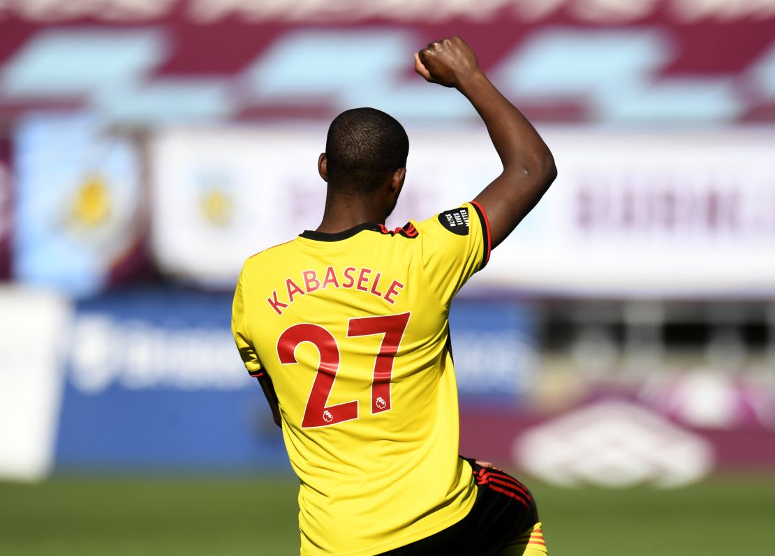 Kabasele takes a knee in support of the Black Lives Matter movement on June 25, 2020.