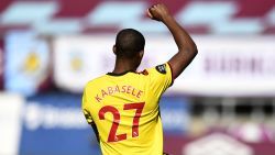 BURNLEY, ENGLAND - JUNE 25: Christian Kabasele of Watford takes a knee in support of the Black Lives Matter movement prior to the Premier League match between Burnley FC and Watford FC at Turf Moor on June 25, 2020 in Burnley, United Kingdom. (Photo by Peter Powell/Pool via Getty Images)