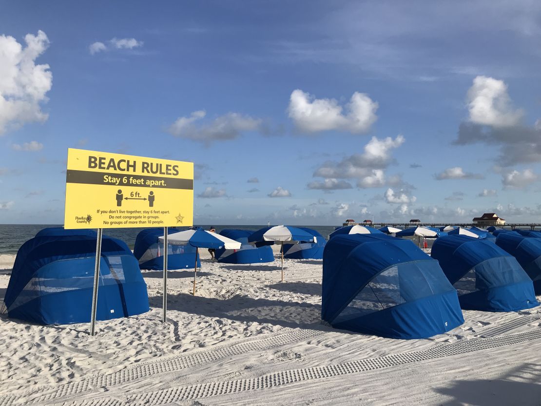 Social distancing signage on Clearwater Beach reminds people to stay six feet apart.