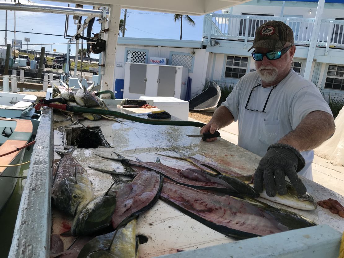 Alex Adler, captain of a fishing charter boat, says Florida's uptick in virus cases is "nerve-wracking."
