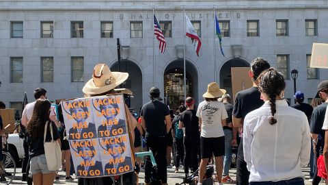 Protesters gather outside Lacey's office in downtown Los Angeles.