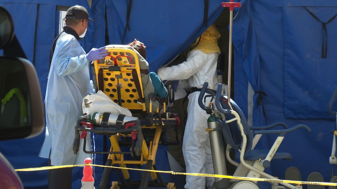 Patients are being triaged inside a tent in the parking lot at El Centro Regional Medical Center.