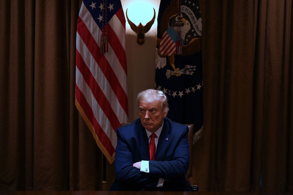 US President Donald Trump sits in the Cabinet Room of the White House before holding a roundtable discussion Thursday, July 9, with administration officials and Hispanic American leaders. <a href="https://www.cnn.com/videos/politics/2020/07/09/trump-taxes-supreme-court-ruling-reaction-diamond-tsr-pkg-vpx.cnn" target="_blank">He lashed out</a> after the Supreme Court ruled that he is not immune from a New York prosecutor's subpoena for his tax return.