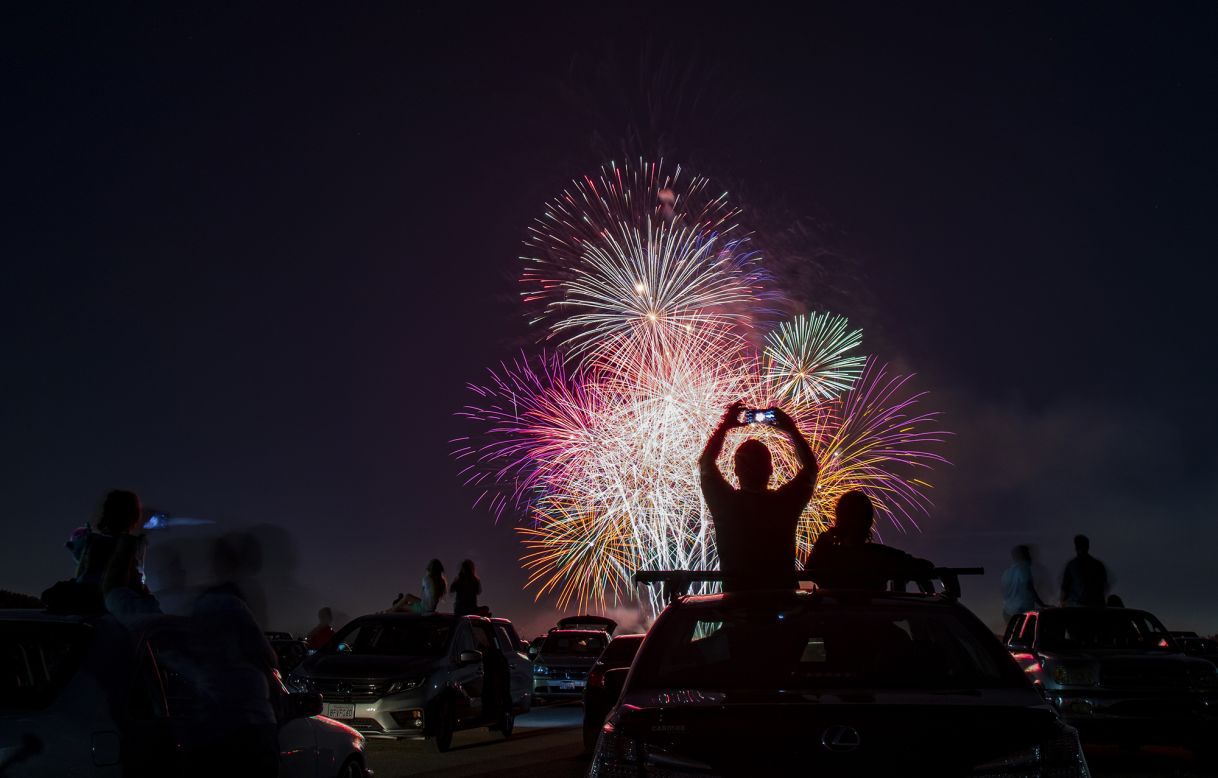 People sit on the roofs of their cars while watching July Fourth fireworks in Los Alamitos, California. <a href="http://www.cnn.com/2020/07/02/world/gallery/week-in-photos-0703/index.html" target="_blank">See last week in 30 photos</a>