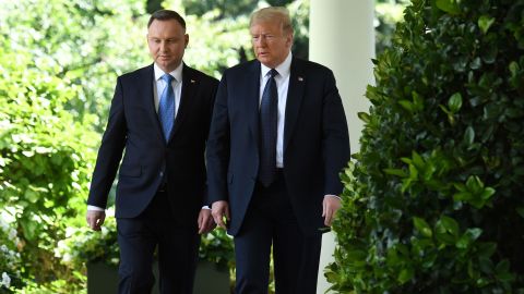 US President Donald Trump walks with his Polish counterpart Andrzej Duda before a press conference at the White House last month.