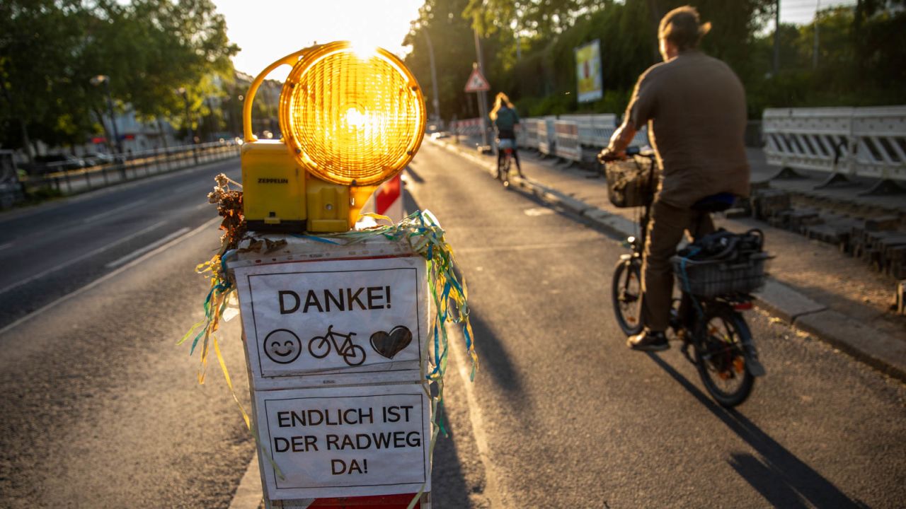 German cities have added bike lanes to help people move around more safely in the wake of the virus.