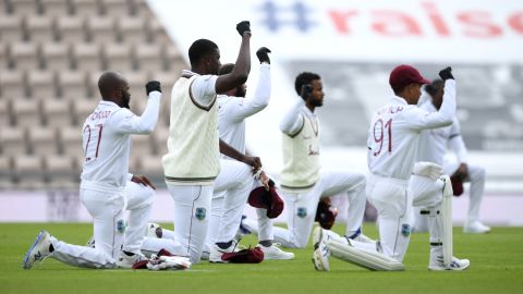 West Indies captain Jason Holder and his teammates take a knee during day one of the fiirst Test match at The Ageas Bowl on July 08, 2020.