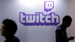 The Twitch Interactive Inc. logo is displayed in the Amazon.com Inc. booth at the Tokyo Game Show 2015 at Makuhari Messe in Chiba, Japan, on Thursday, Sept. 17, 2015. There will be record attendance at this year's show with 473 vendors, including more than half from abroad, as of Sept. 1, according to organizers.  Photographer: Kiyoshi Ota/Bloomberg via Getty Images